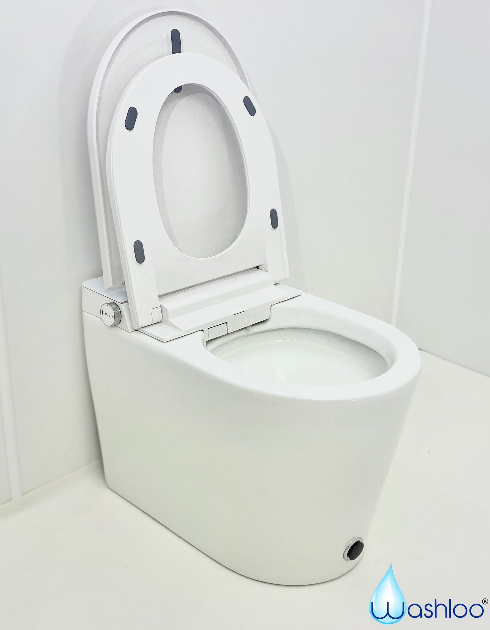 Close-up of a Washloo smart toilet seat with the control panel and retractable wash nozzle, set in a clean modern bathroom