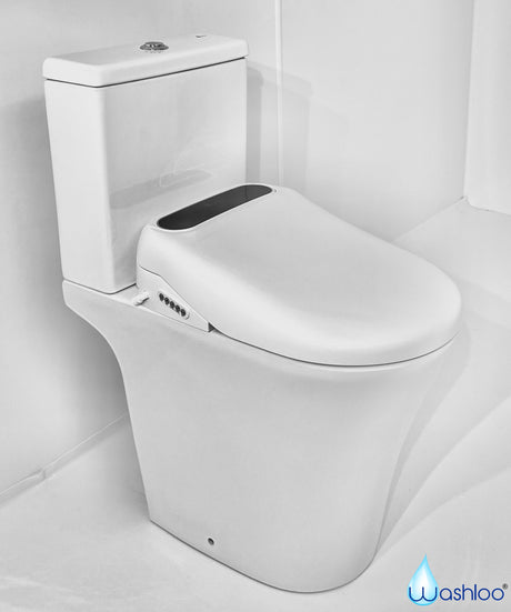 A studio product photograph of a Washloo smart bidet seat mounted on a modern ceramic toilet bowl highlighting its sleek side control panel and soft-close lid against a clean white background.