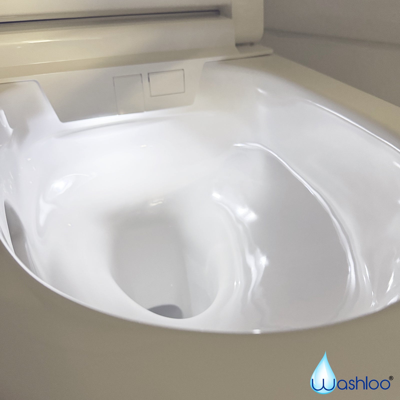 A pristine studio product photograph of a standalone Washloo wash and dry toilet seat highlighting its subtle internal LED nightlight glow against a clean white background.